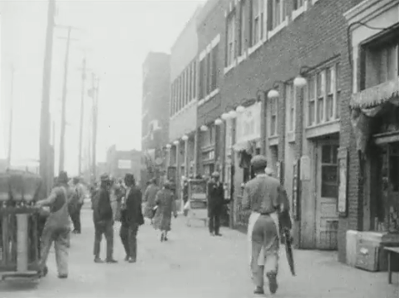 Tulsa's Greenwood Ave, west side looking south, circa 1925, from S. S. Jones film collection