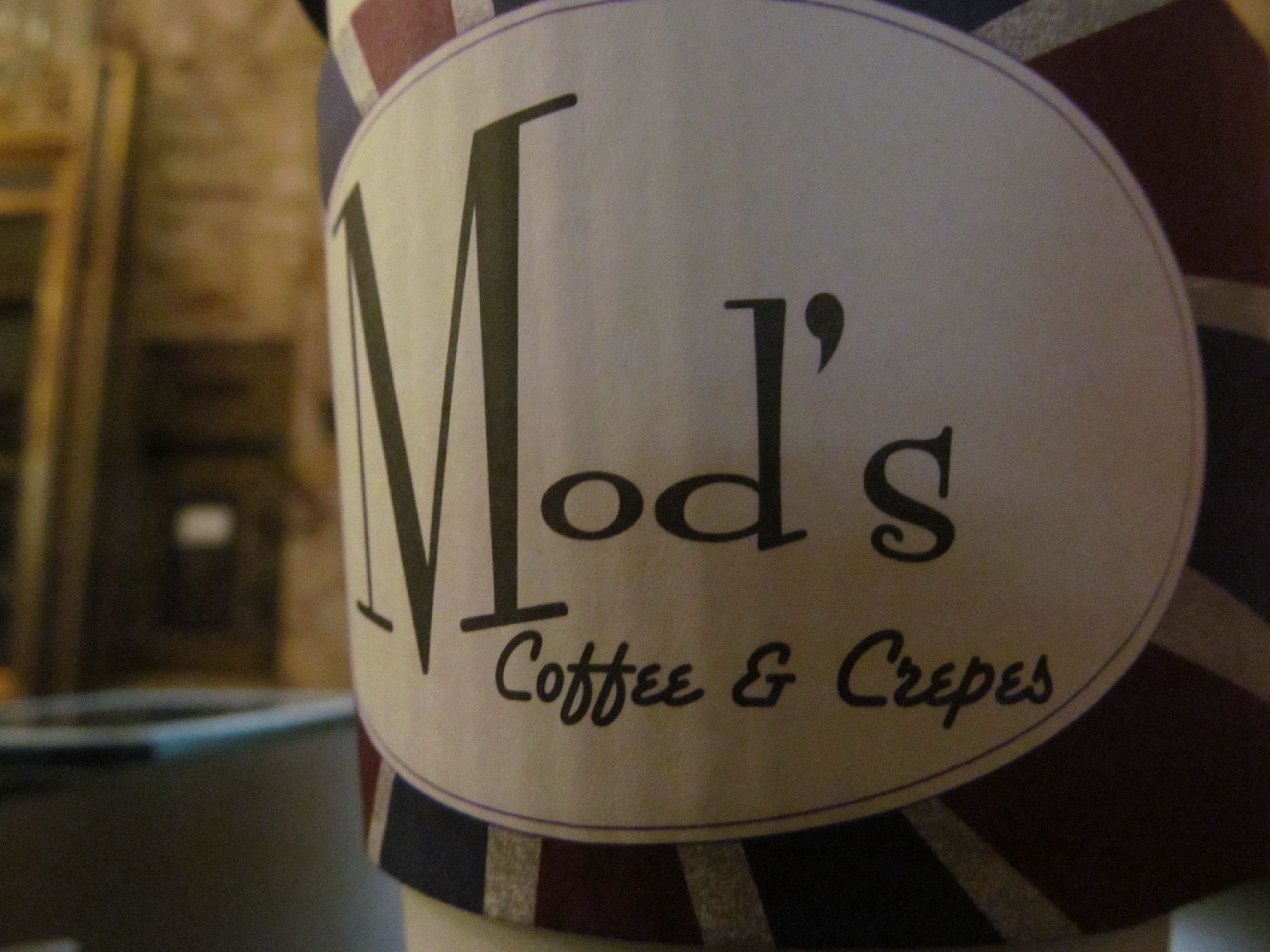 Mod's Coffee & Crepes coffee sleeve