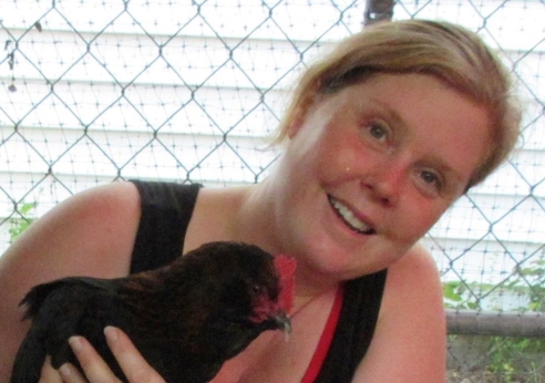 Tina Nettles with one of her backyard hens