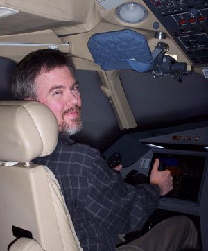 Michael Bates in a Falcon 900 simulator