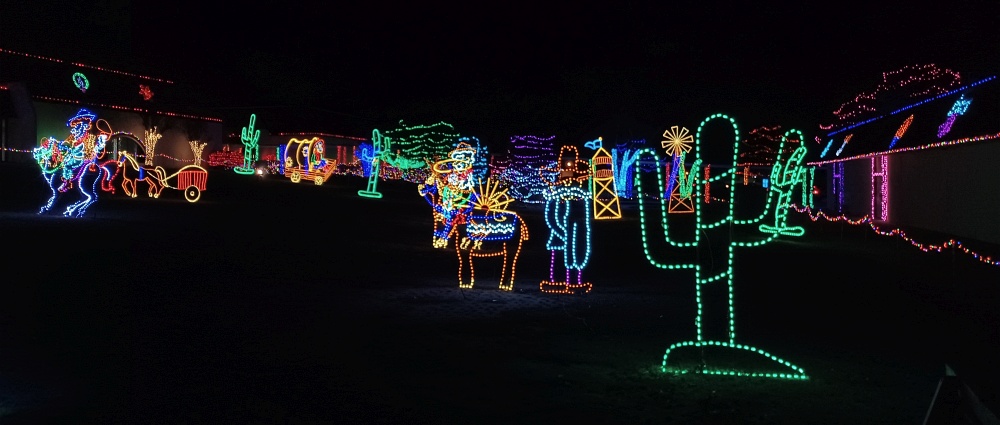 Rhema Bible Training College western-themed Christmas lights, with saguaro cactus, cowboys, windmills, covered wagon, water tower